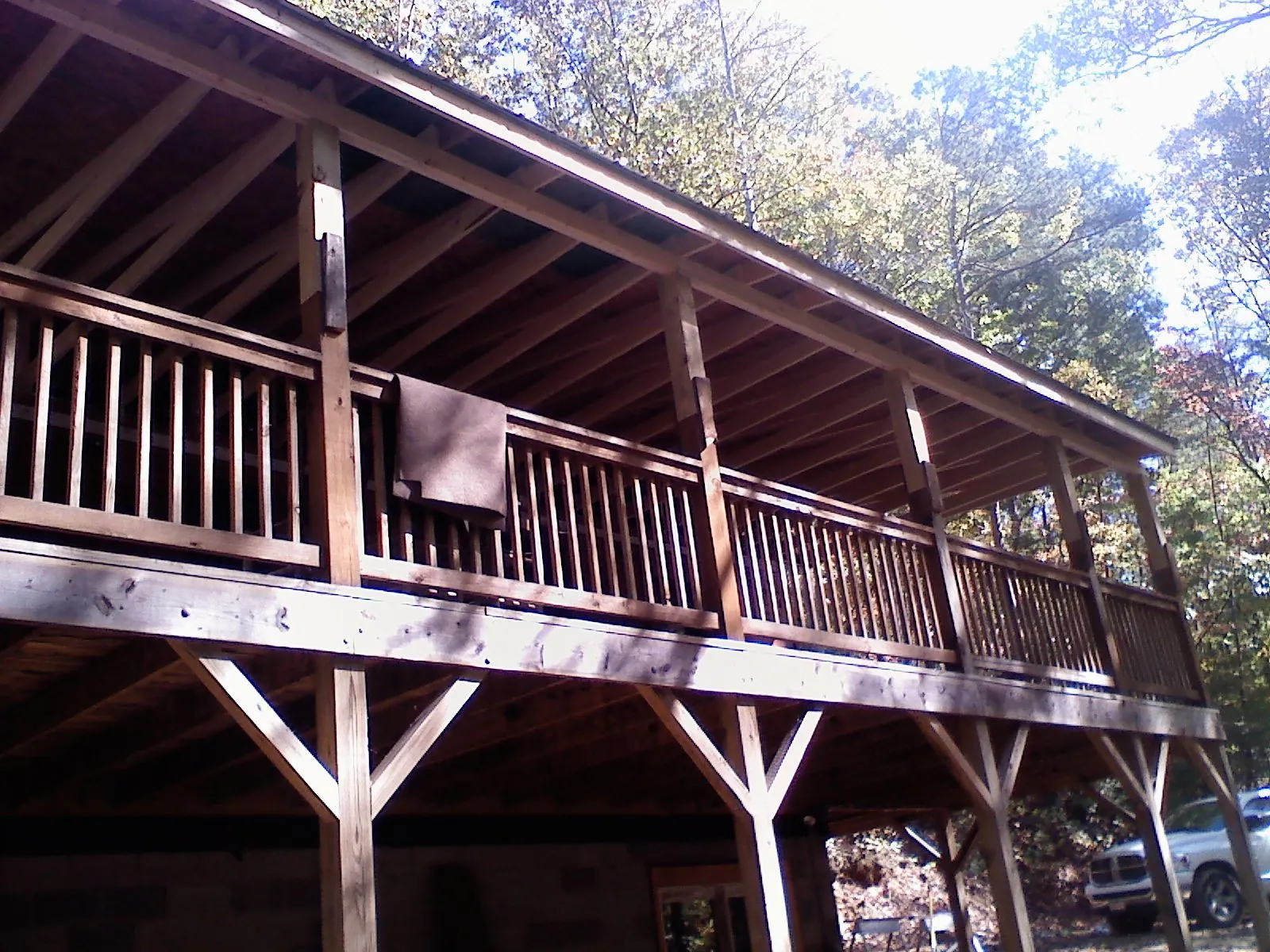 Timber framing under a new elevated porch and deck — Roof Leak Repair in Woodridge by Roofing Brothers